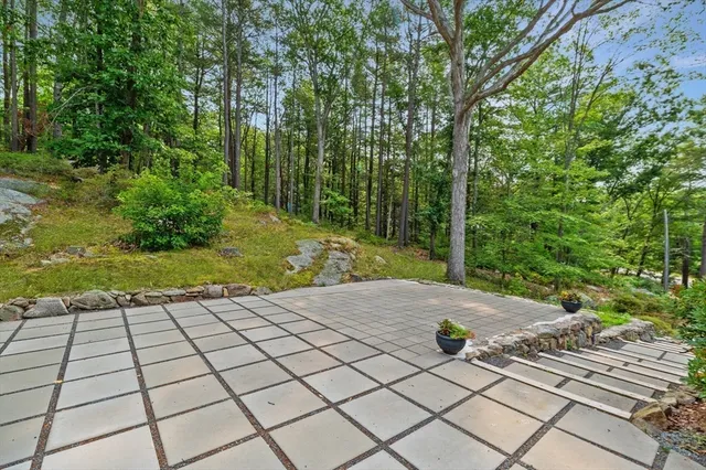 a view of a backyard of the house