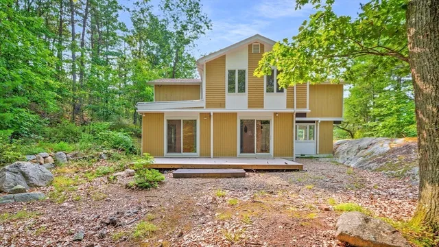 front view of a house with a small yard