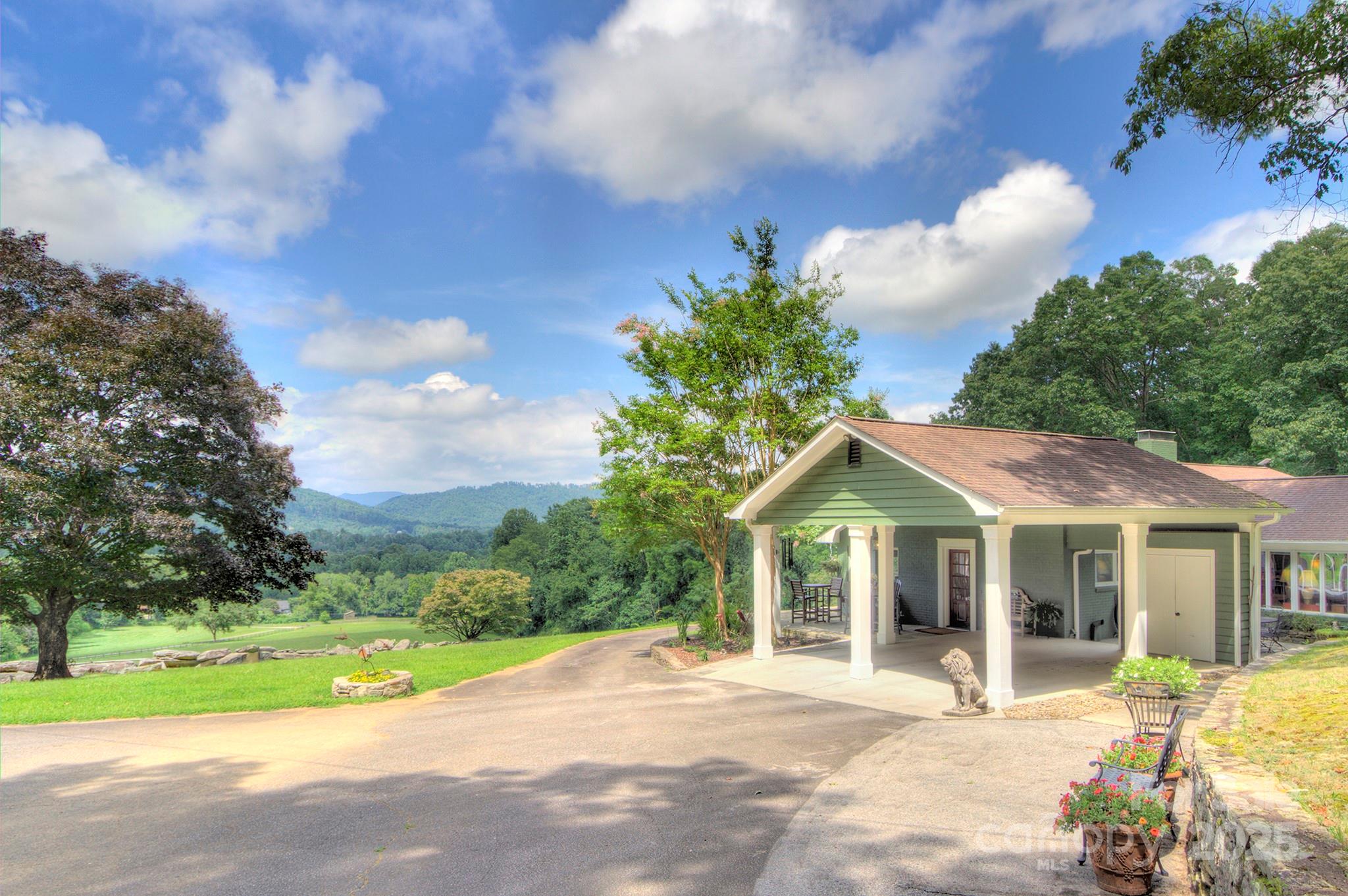 193 Duncan Creek Road Fletcher, NC 28732 - Photo 15 of 48 a view of house with yard and entertaining space