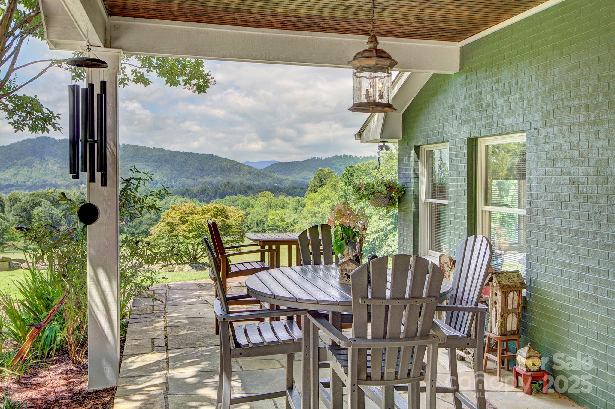 193 Duncan Creek Road Fletcher, NC 28732 - Photo 16 of 48 a view of an outdoor dining space with furniture