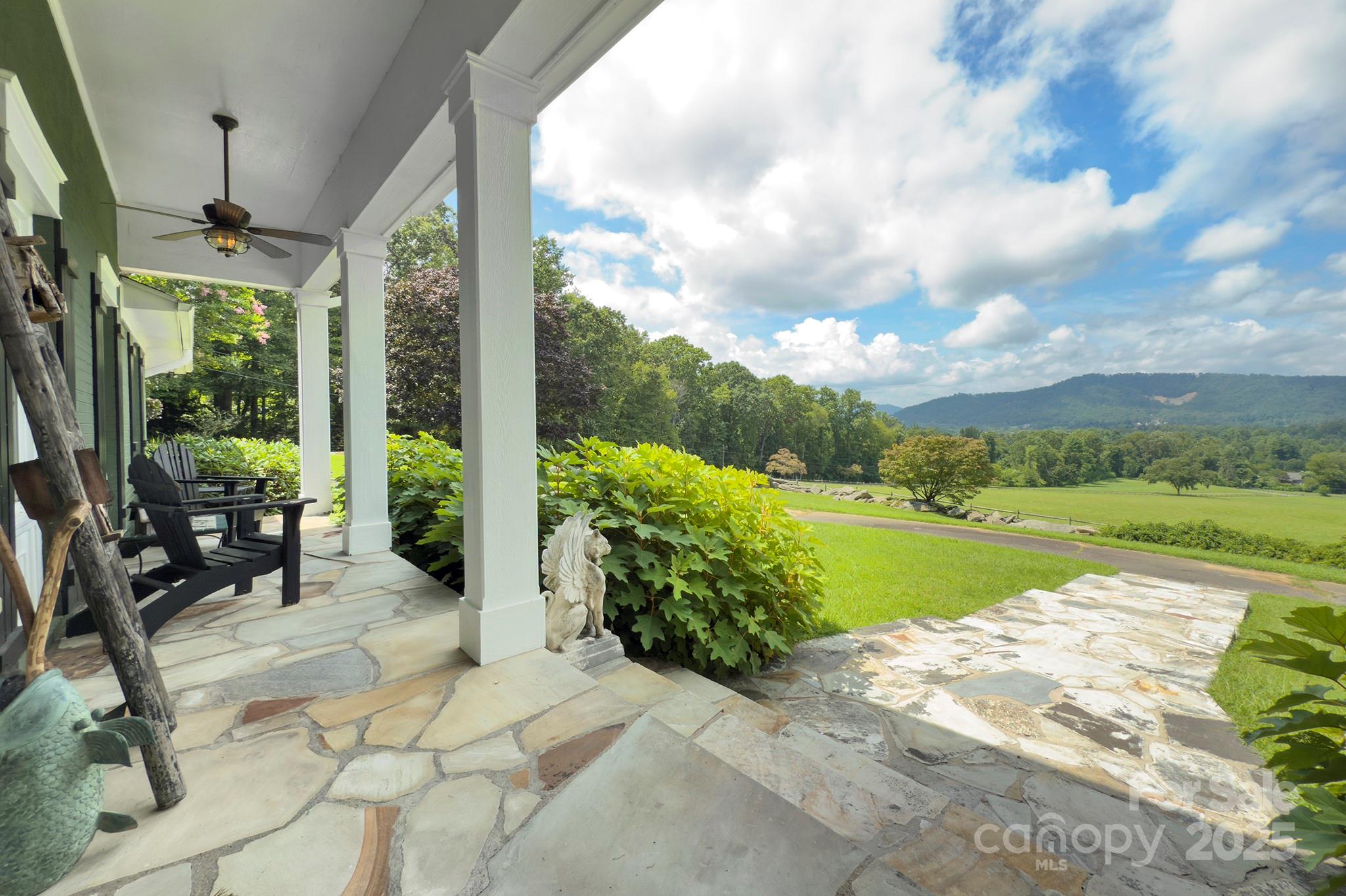193 Duncan Creek Road Fletcher, NC 28732 - Photo 17 of 48 a view of a patio with a yard