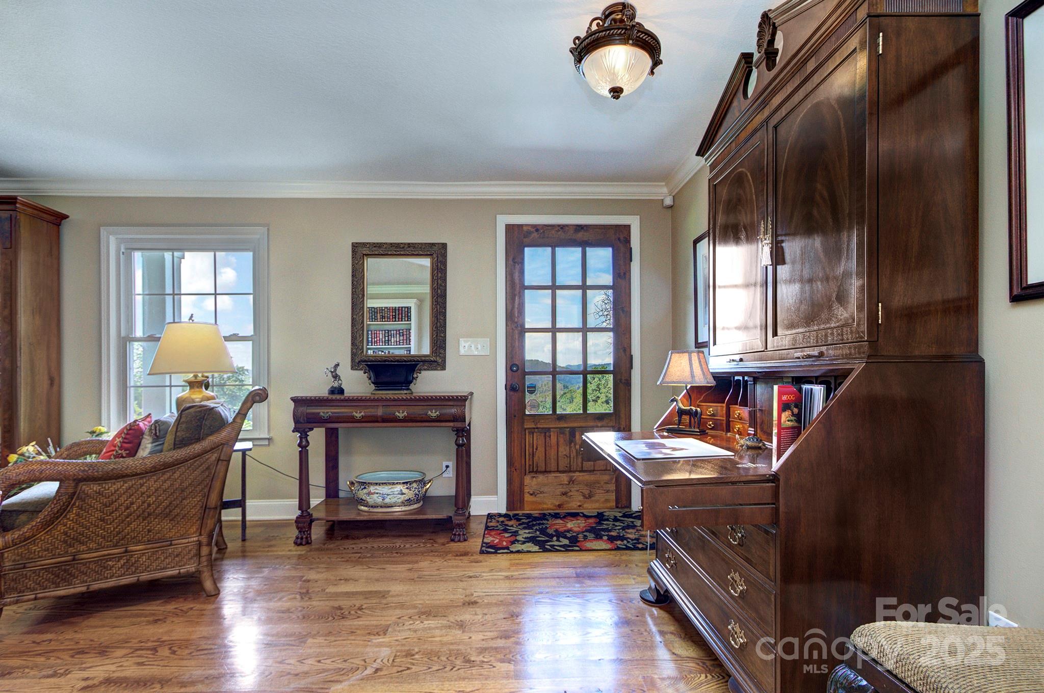 193 Duncan Creek Road Fletcher, NC 28732 - Photo 18 of 48 a living room with furniture and a fireplace