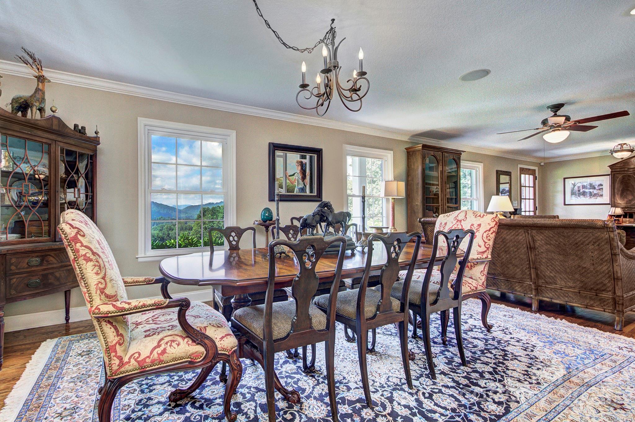 193 Duncan Creek Road Fletcher, NC 28732 - Photo 20 of 48 a view of a dining room with furniture window and wooden floor