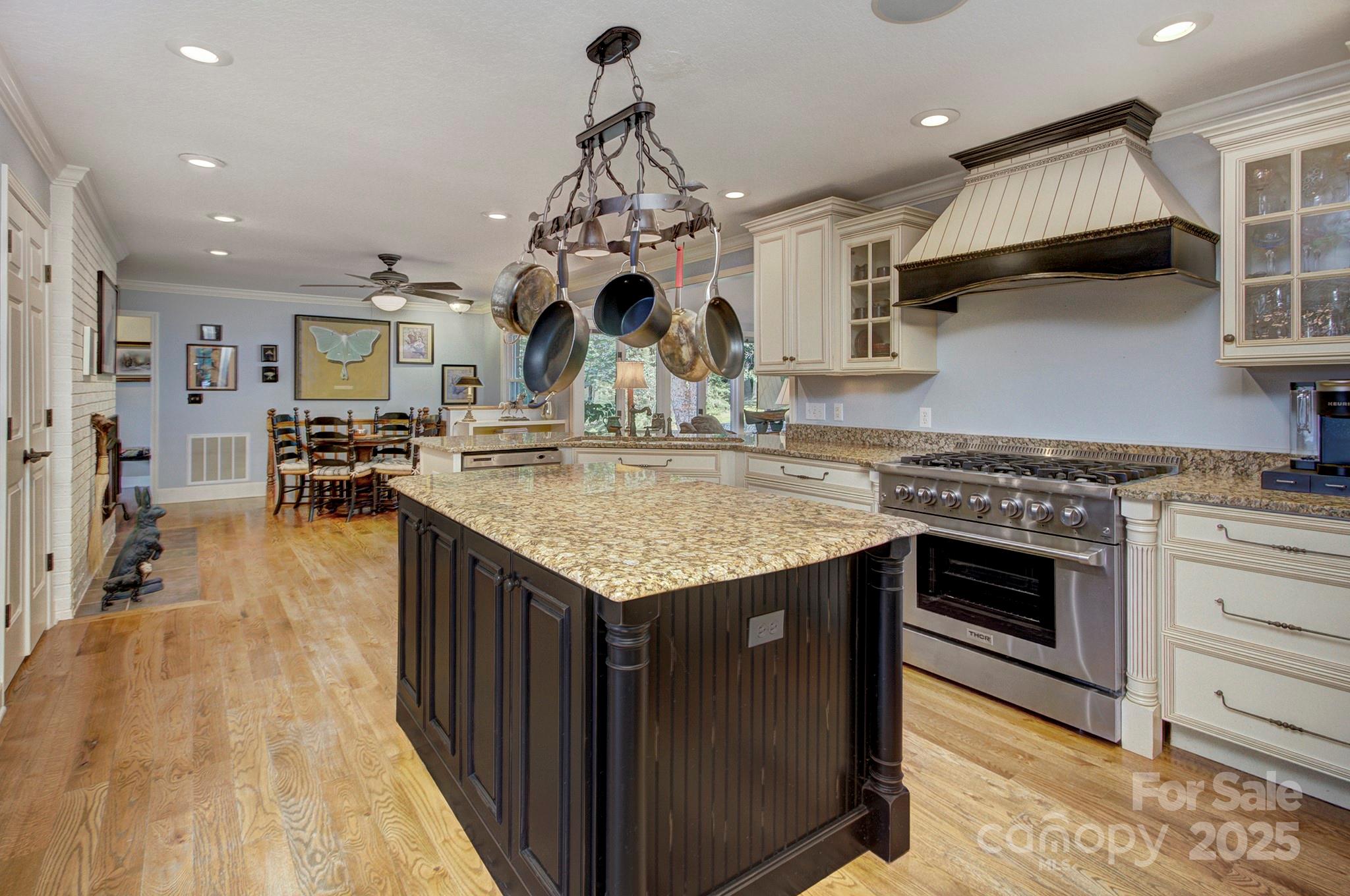 193 Duncan Creek Road Fletcher, NC 28732 - Photo 23 of 48 a kitchen with stainless steel appliances granite countertop a stove and cabinets