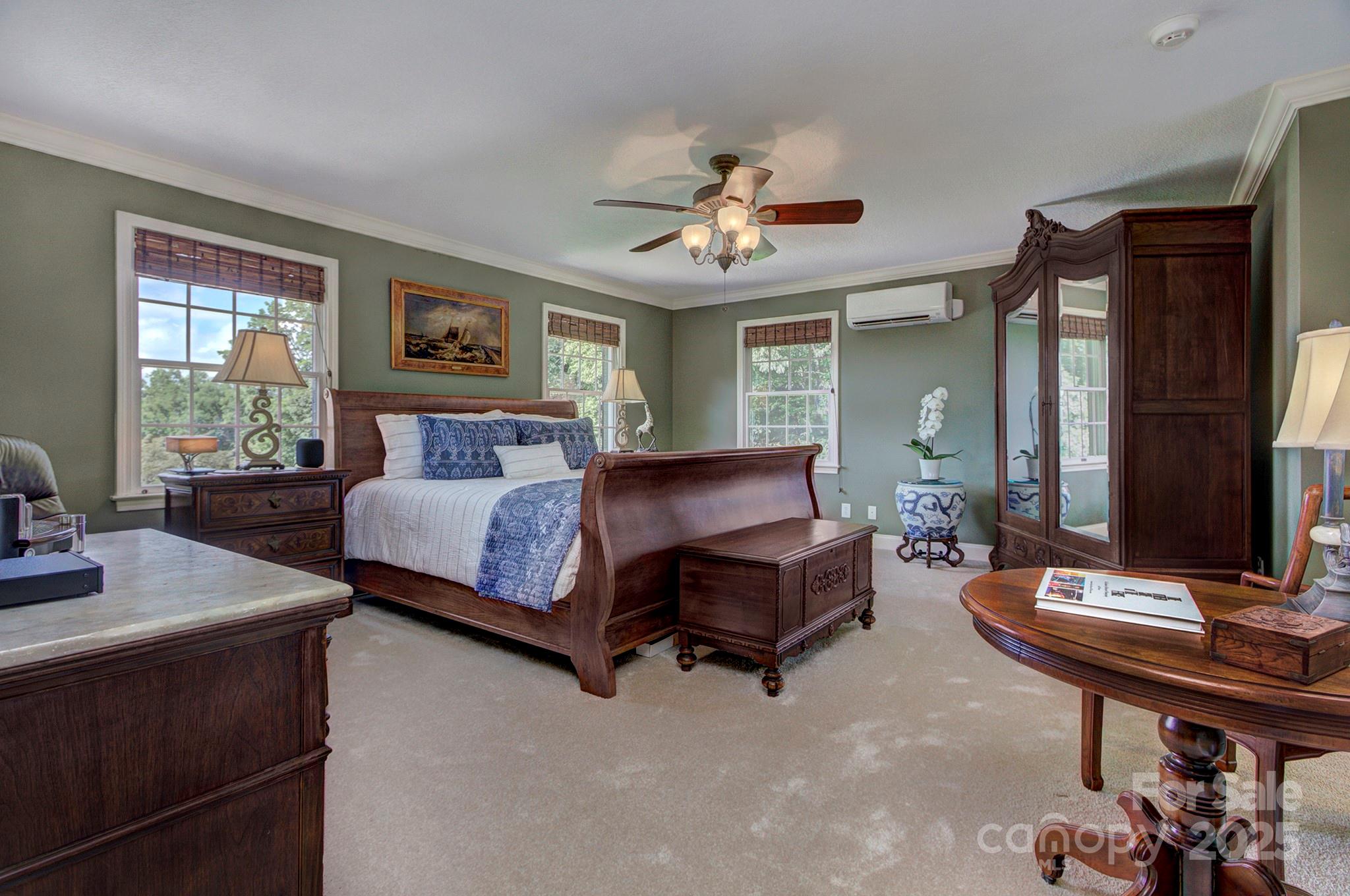 193 Duncan Creek Road Fletcher, NC 28732 - Photo 27 of 48 a bedroom with a bed and a table