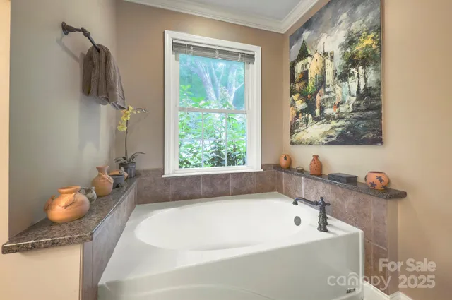 a bath tub sitting next to a window