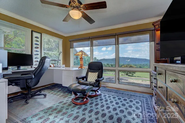 a workspace with furniture and a window