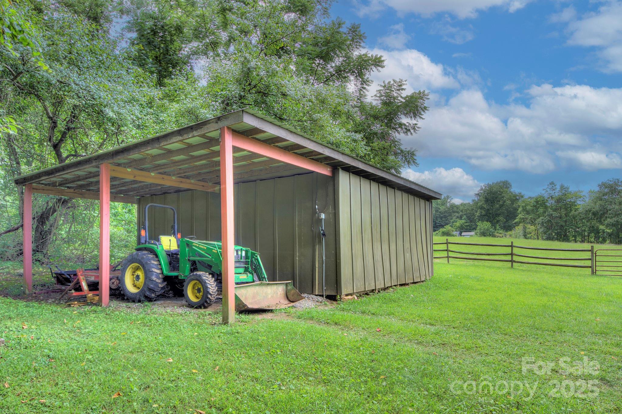 193 Duncan Creek Road Fletcher, NC 28732 - Photo 40 of 48 a view of a house with a backyard
