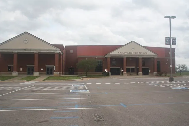 a car parked in front of a building