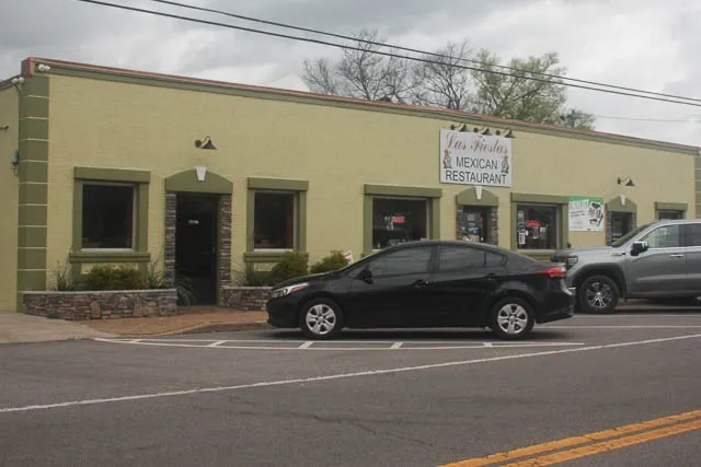 a car parked in front of a building