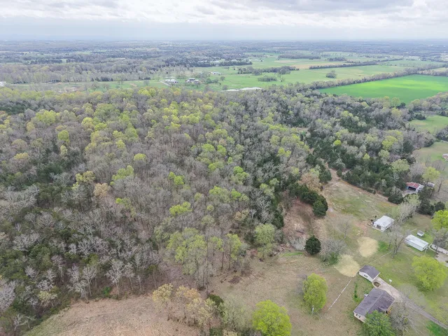 a view of lake with green space