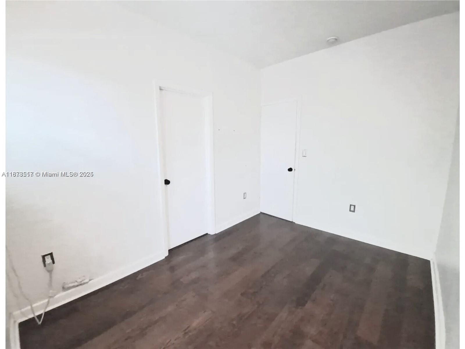 1009 Meridian Avenue, Unit 13 Miami Beach, FL 33139 - Photo 13 of 17 a view of an empty room