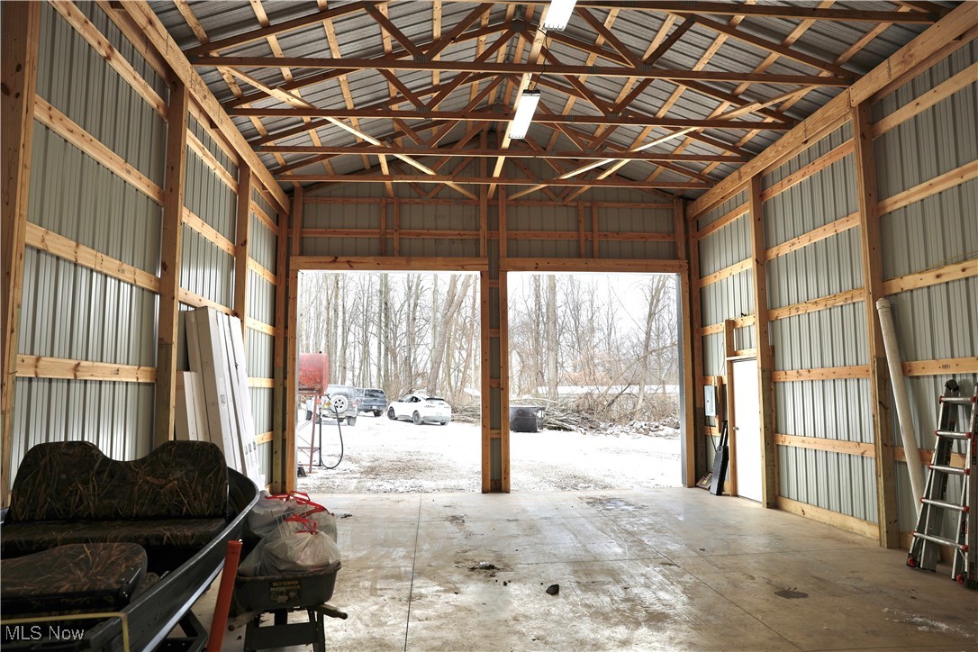 29311 Rabbit Ridge Road Howard, OH 43028 - Photo 27 of 39 Snow covered garage featuring metal wall