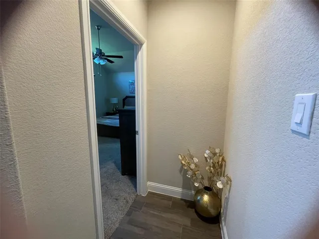 a view of a house with swimming pool and porch