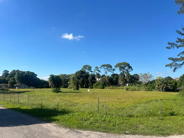 a view of a golf course with a lake