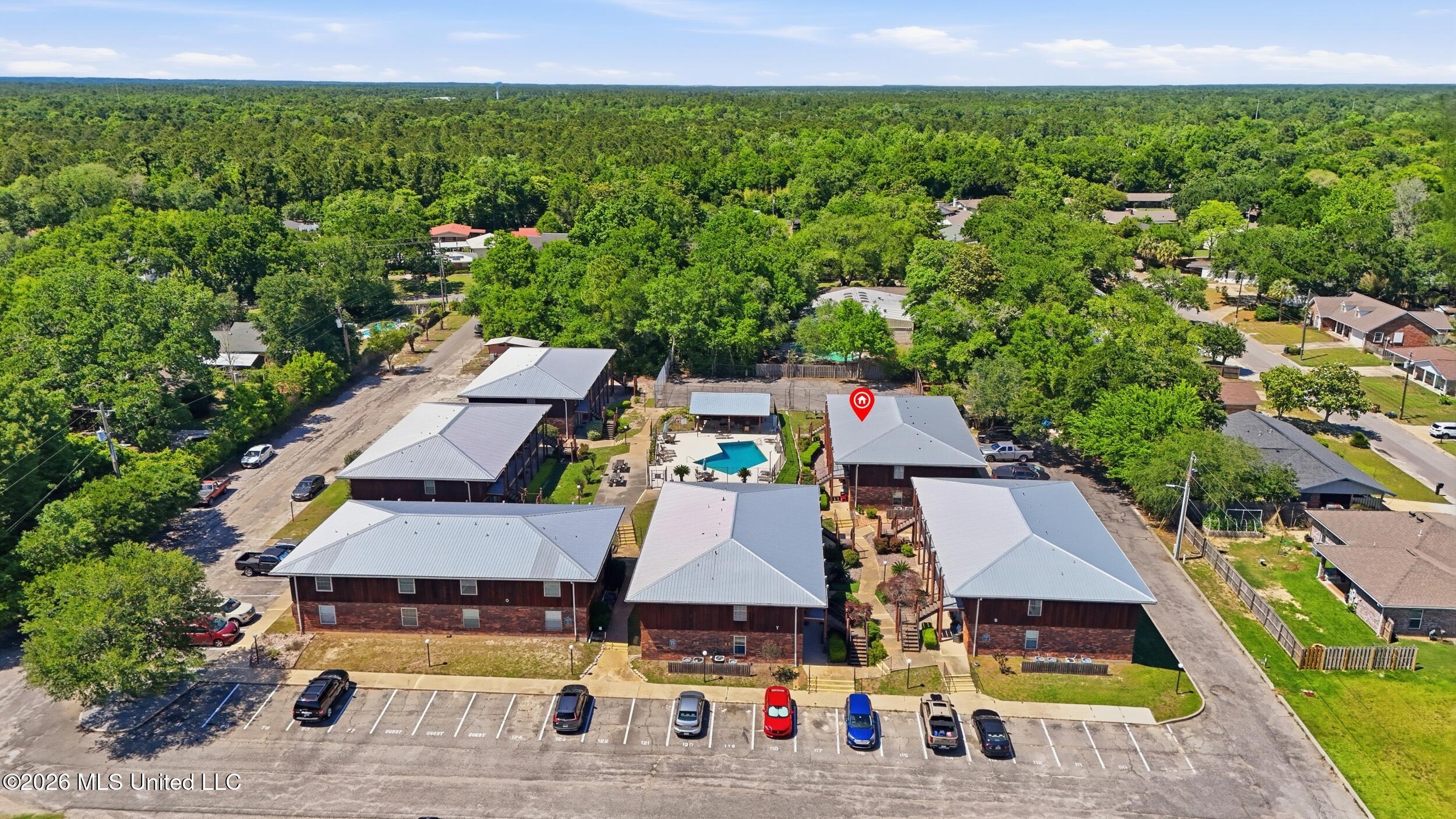 1550 East 2nd Street, Unit R105 Pass Christian, MS 39571 - Photo 28 of 36 31_dji_20260504144747_0035_d_stamped_532