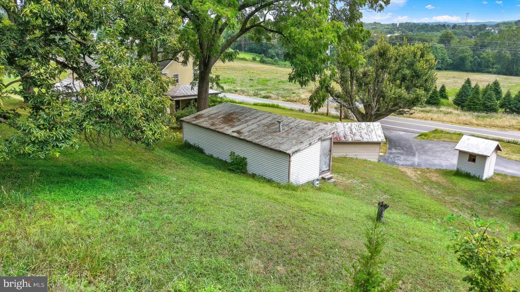235 Camp Ground Road Dillsburg, PA 17019 - Photo 26 of 61 a view of a backyard with a barn