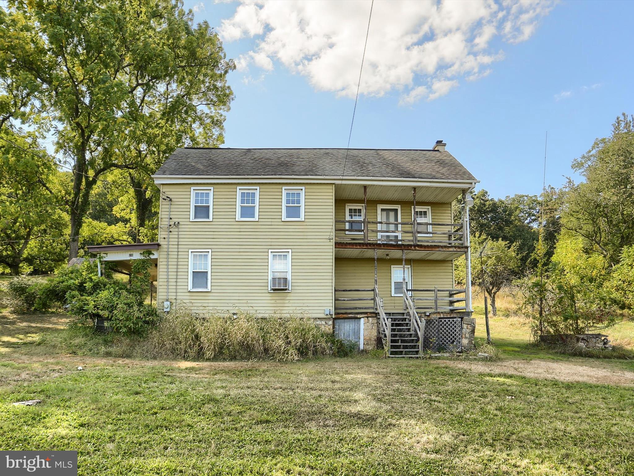 235 Camp Ground Road Dillsburg, PA 17019 - Photo 29 of 61 a front view of a house with a garden