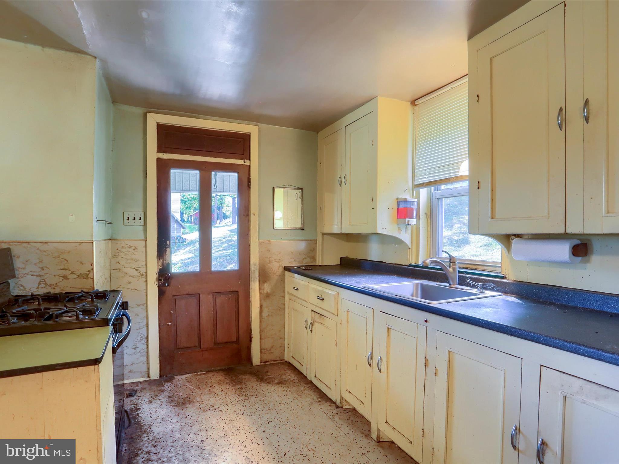 235 Camp Ground Road Dillsburg, PA 17019 - Photo 32 of 61 a kitchen that has a sink and a stove in it
