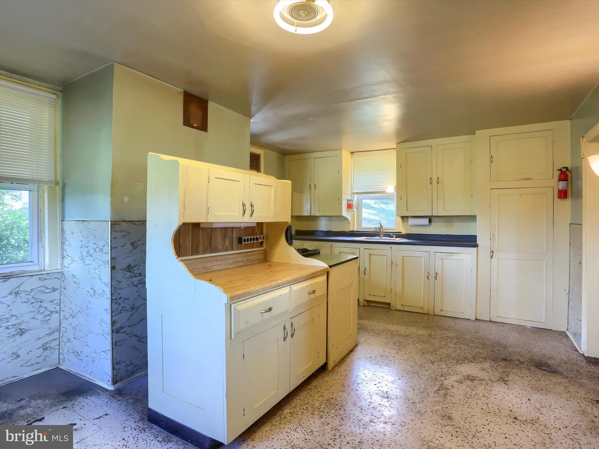 235 Camp Ground Road Dillsburg, PA 17019 - Photo 35 of 61 a kitchen that has a sink and a stove in it