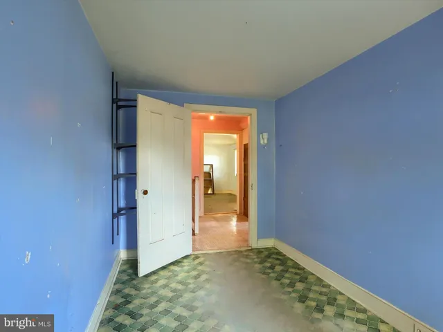 a front view of house with outdoor space and swimming pool