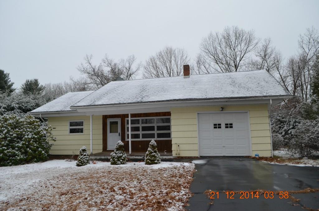 579 Babbs Road Suffield, CT 06093 - Photo 1 of 1 a front view of a house with garden