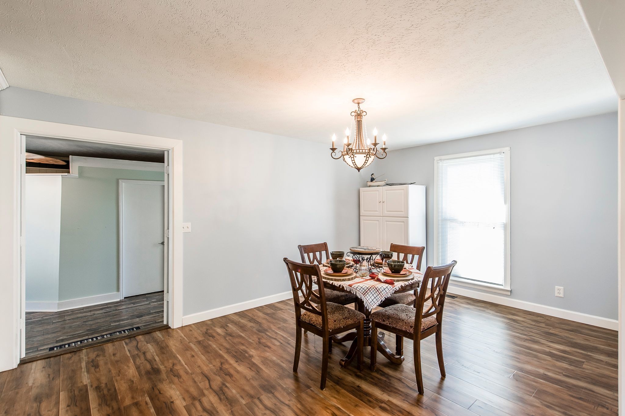 1881 Pinnacle Road Pleasant View, TN 37146 - Photo 11 of 62 a view of a dining room with furniture and wooden floor
