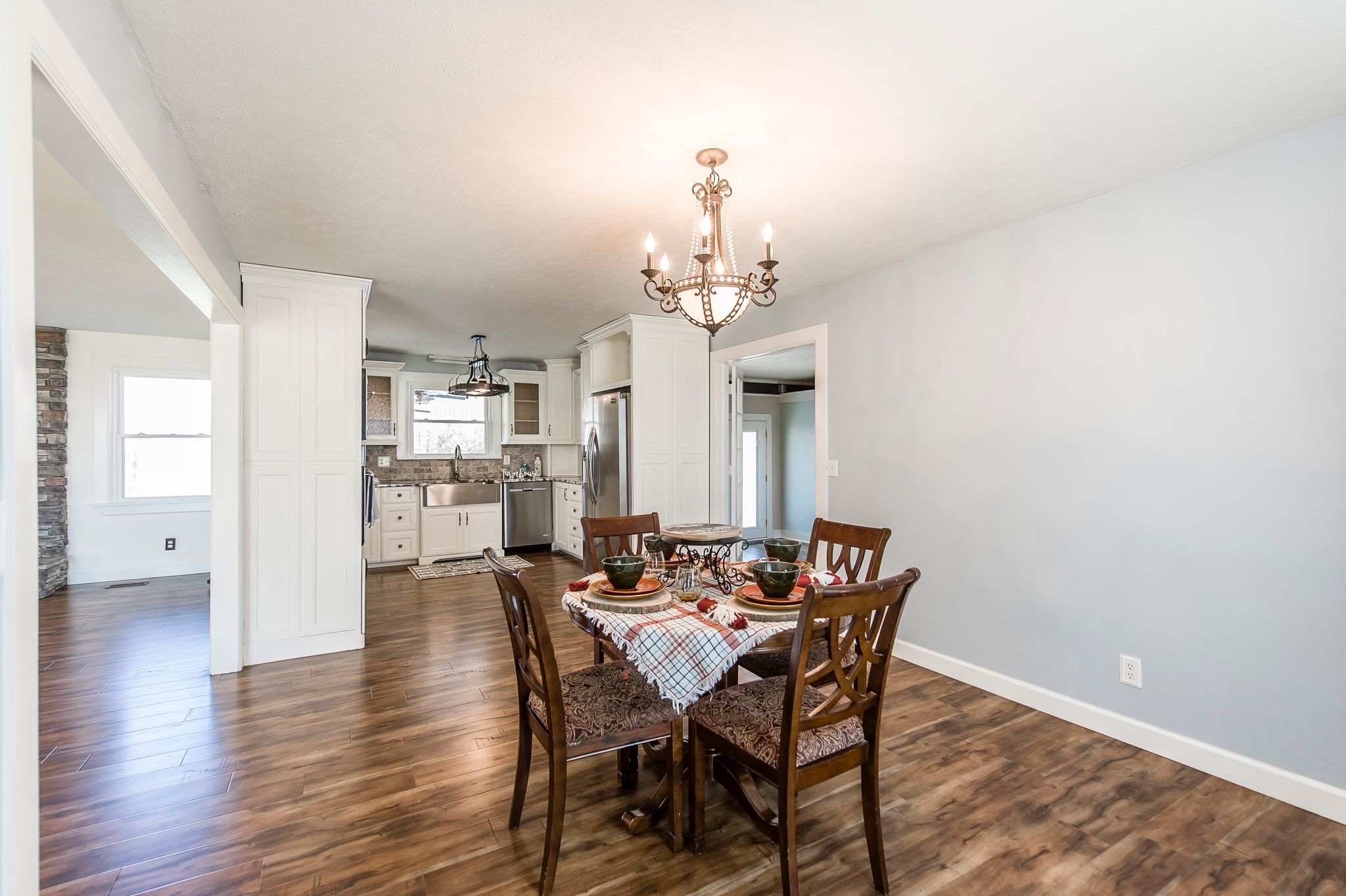 1881 Pinnacle Road Pleasant View, TN 37146 - Photo 13 of 62 a view of a dining room with furniture and wooden floor