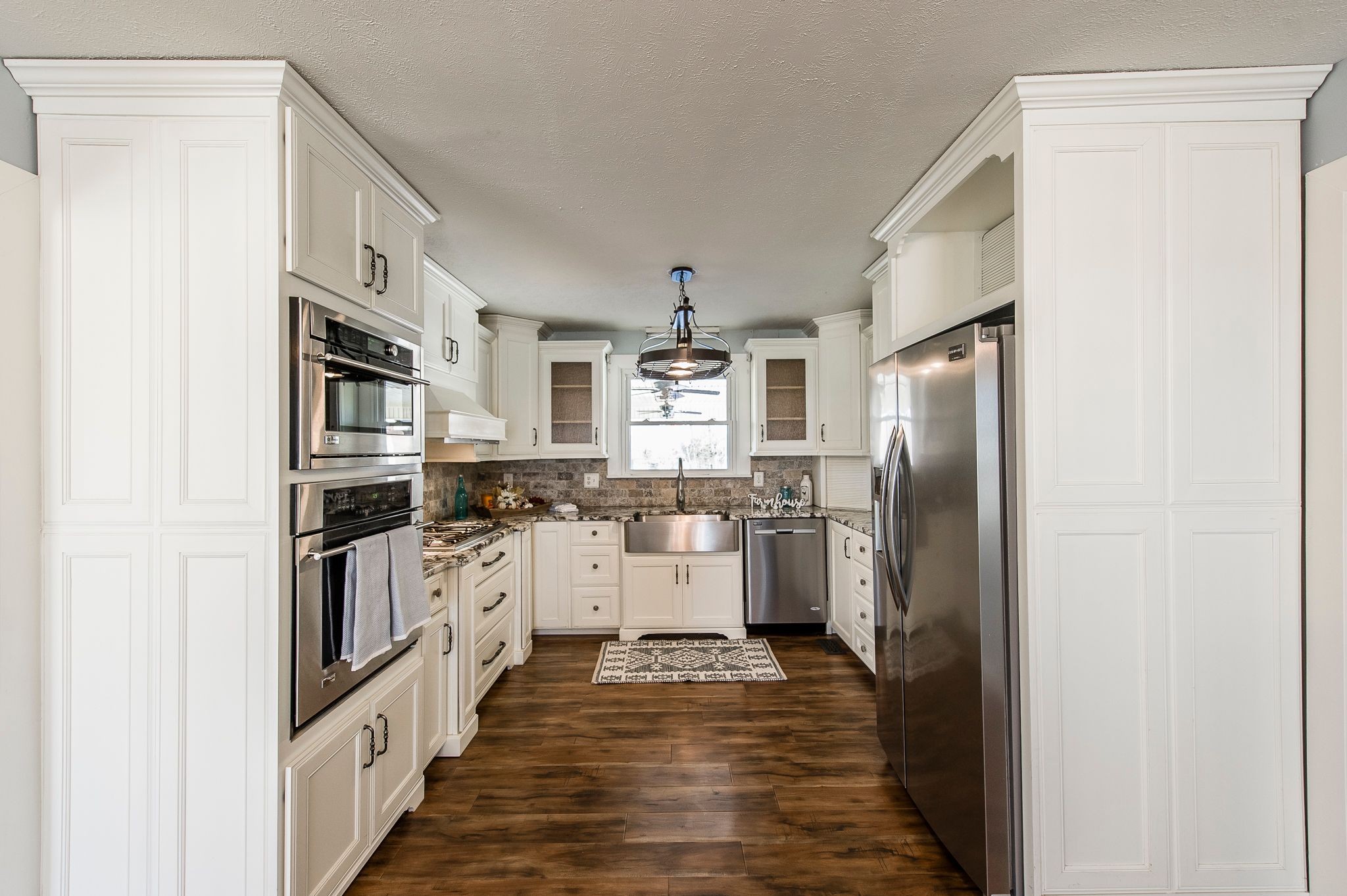 1881 Pinnacle Road Pleasant View, TN 37146 - Photo 14 of 62 a kitchen with cabinets and stainless steel appliances