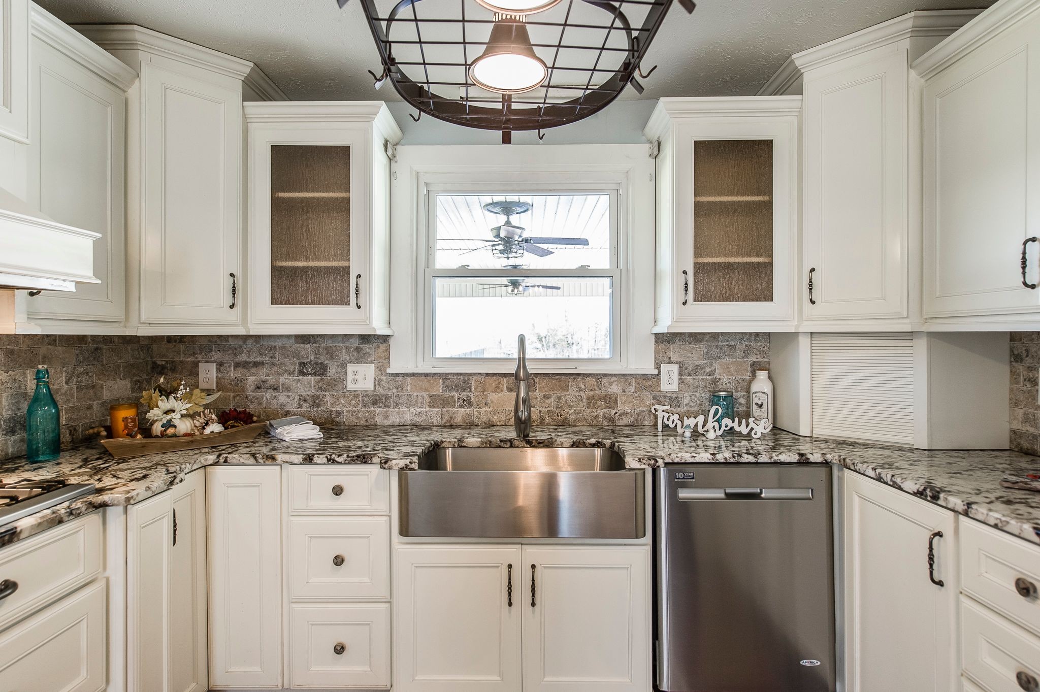 1881 Pinnacle Road Pleasant View, TN 37146 - Photo 17 of 62 a kitchen with stainless steel appliances granite countertop a sink a stove and cabinets