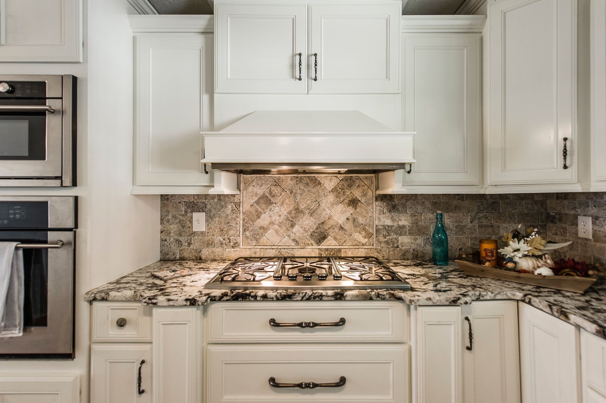 1881 Pinnacle Road Pleasant View, TN 37146 - Photo 18 of 62 a stove top oven sitting inside of a kitchen