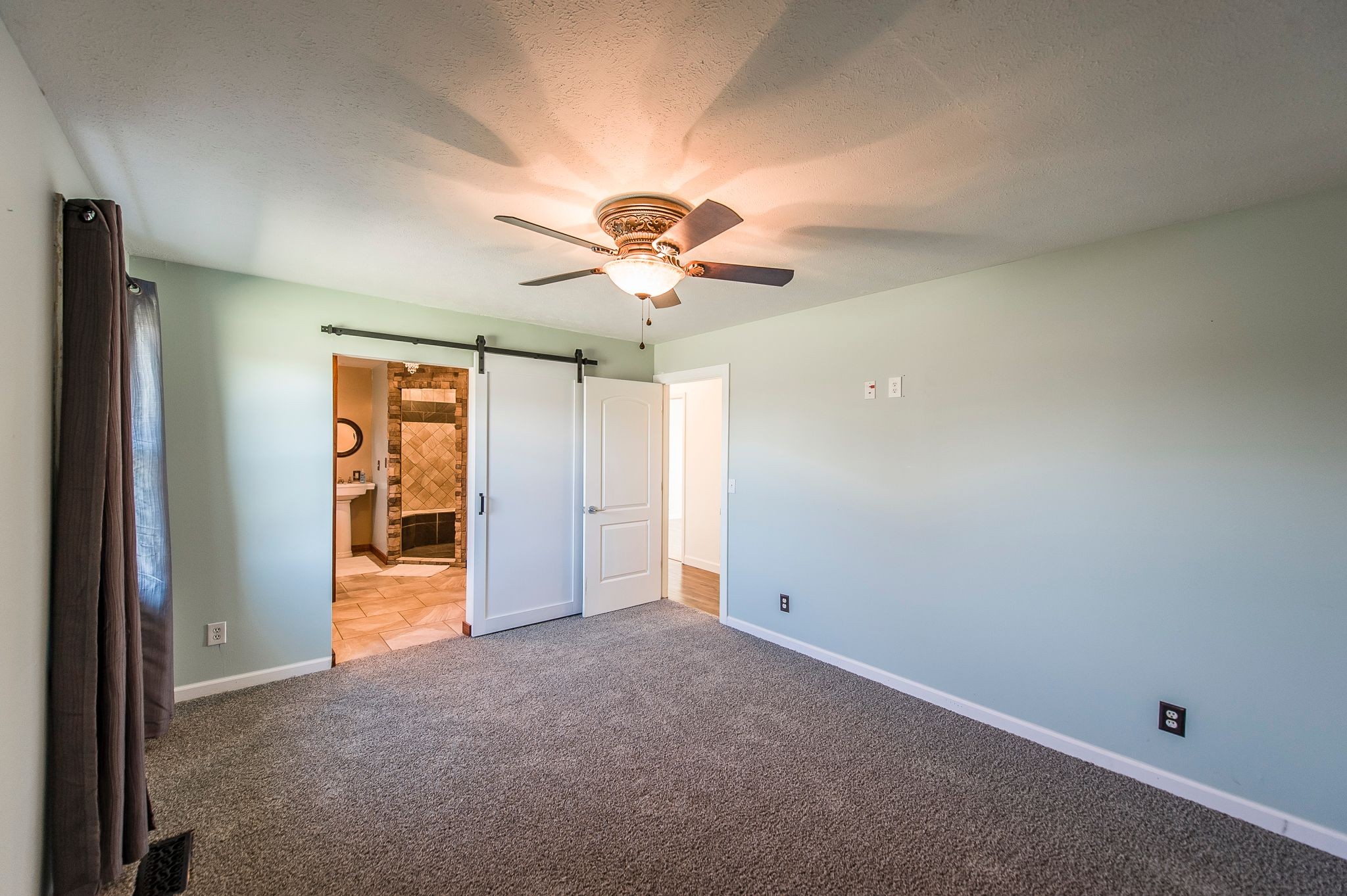1881 Pinnacle Road Pleasant View, TN 37146 - Photo 28 of 62 an empty room with closet and a ceiling fan