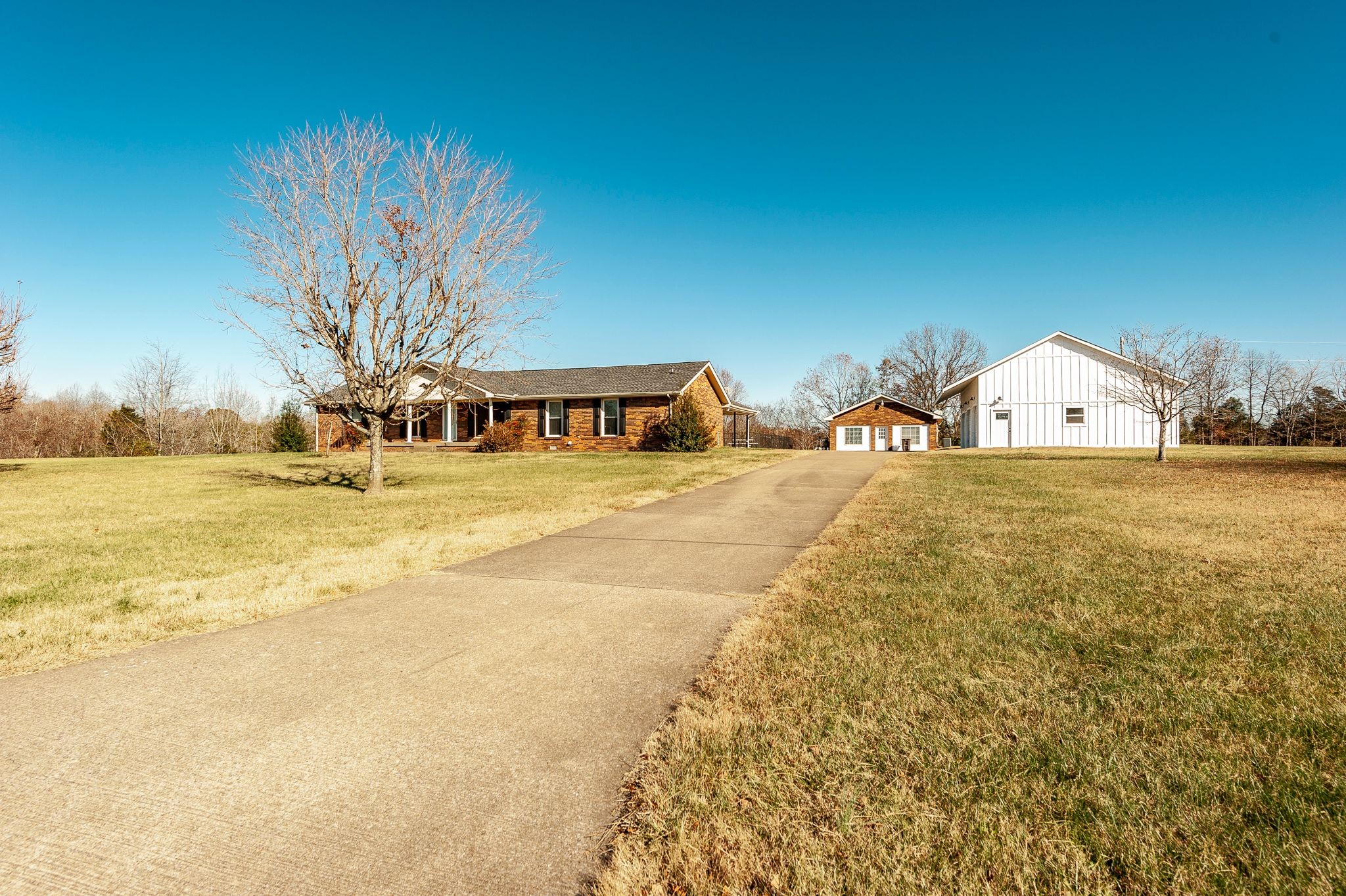 1881 Pinnacle Road Pleasant View, TN 37146 - Photo 3 of 62 a view of a swimming pool with an outdoor space and seating area