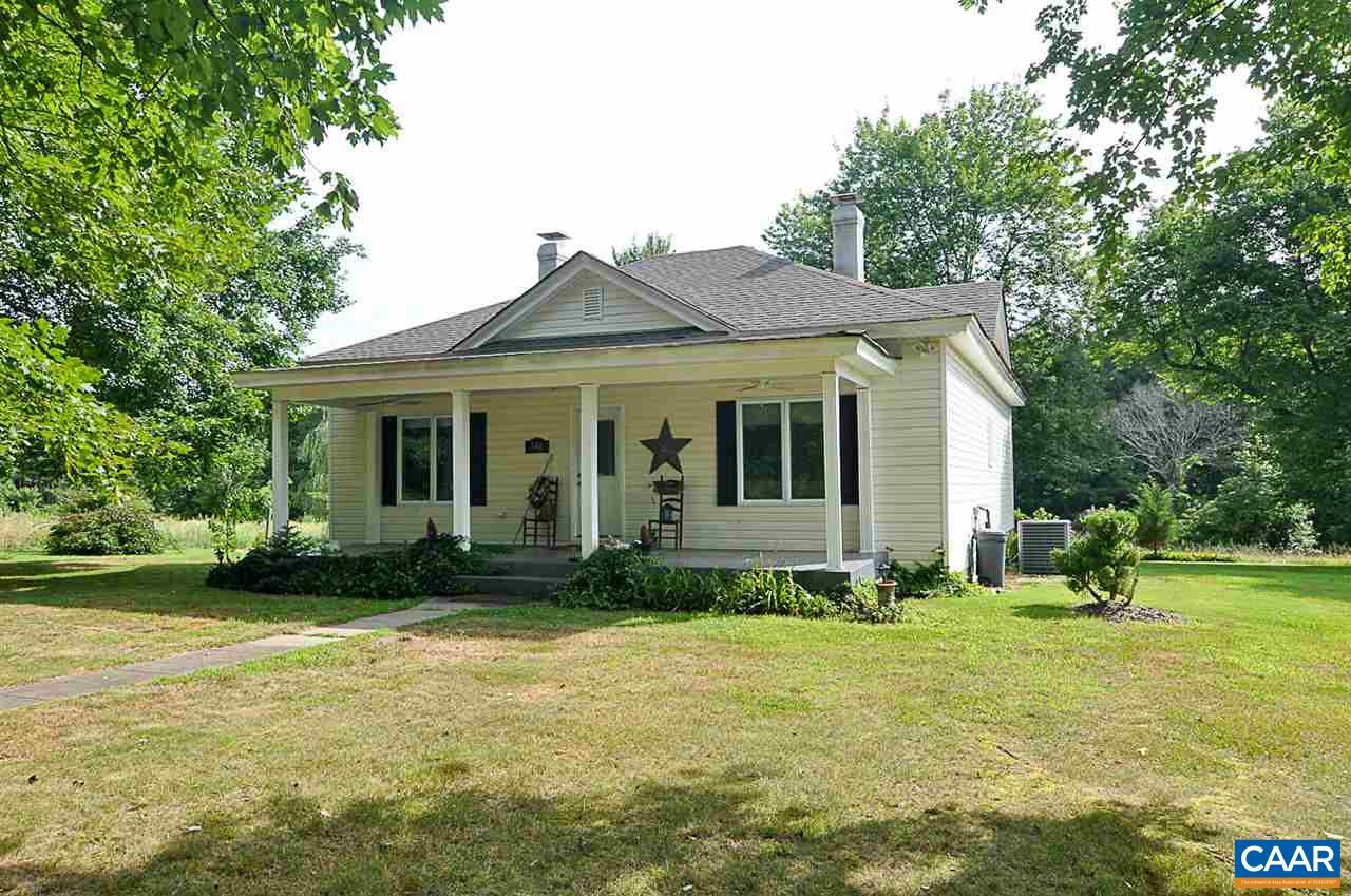 341 Grace Johnson Road Kents Store, VA 23084 - Photo 1 of 32 a view of a house with a yard and plants