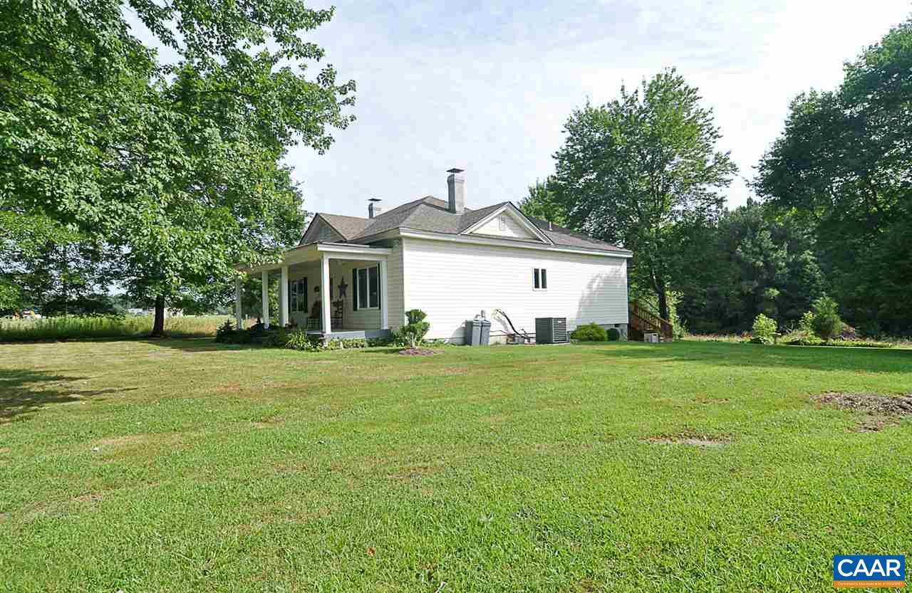 341 Grace Johnson Road Kents Store, VA 23084 - Photo 2 of 32 a front view of house with yard and green space