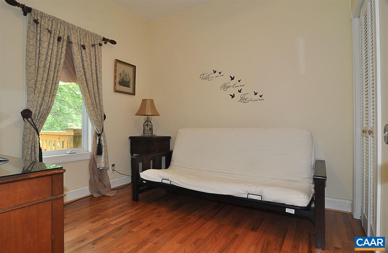 341 Grace Johnson Road Kents Store, VA 23084 - Photo 30 of 32 a bedroom with a bed and a window