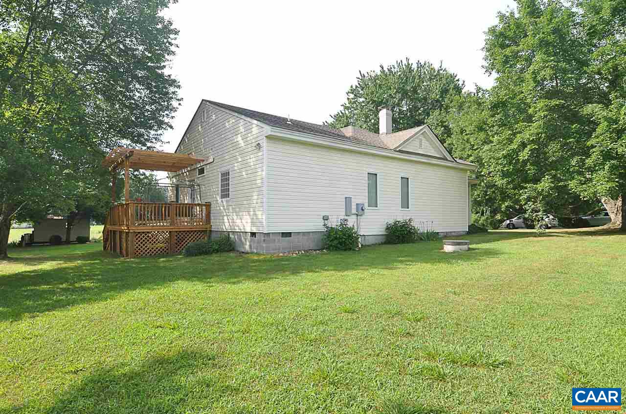 341 Grace Johnson Road Kents Store, VA 23084 - Photo 3 of 32 a view of a house with backyard and garden