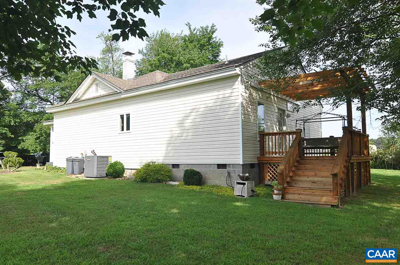 341 Grace Johnson Road Kents Store, VA 23084 - Photo 5 of 32 a view of a house with backyard
