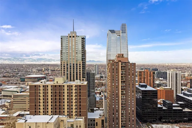 a view of a city with tall buildings