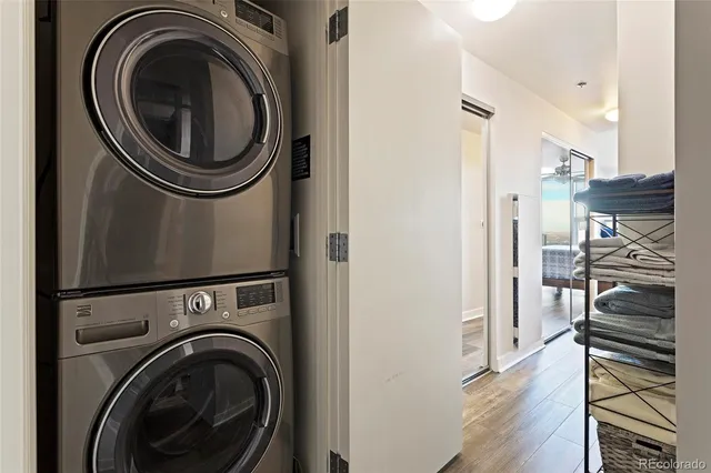 a view of a hallway with washer and dryer