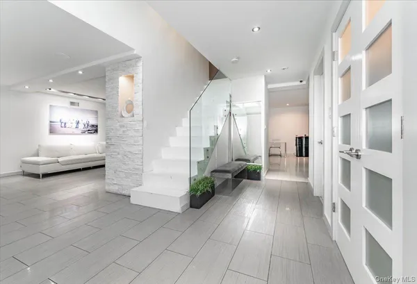 a view of a hallway with a couch