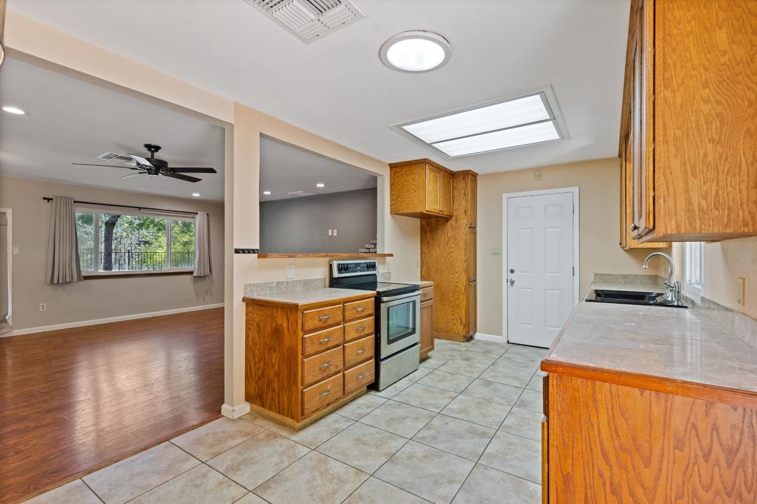 2971 Letitia Avenue Placerville, CA 95667 - Photo 61 of 65 a kitchen with stainless steel appliances granite countertop a sink and cabinets