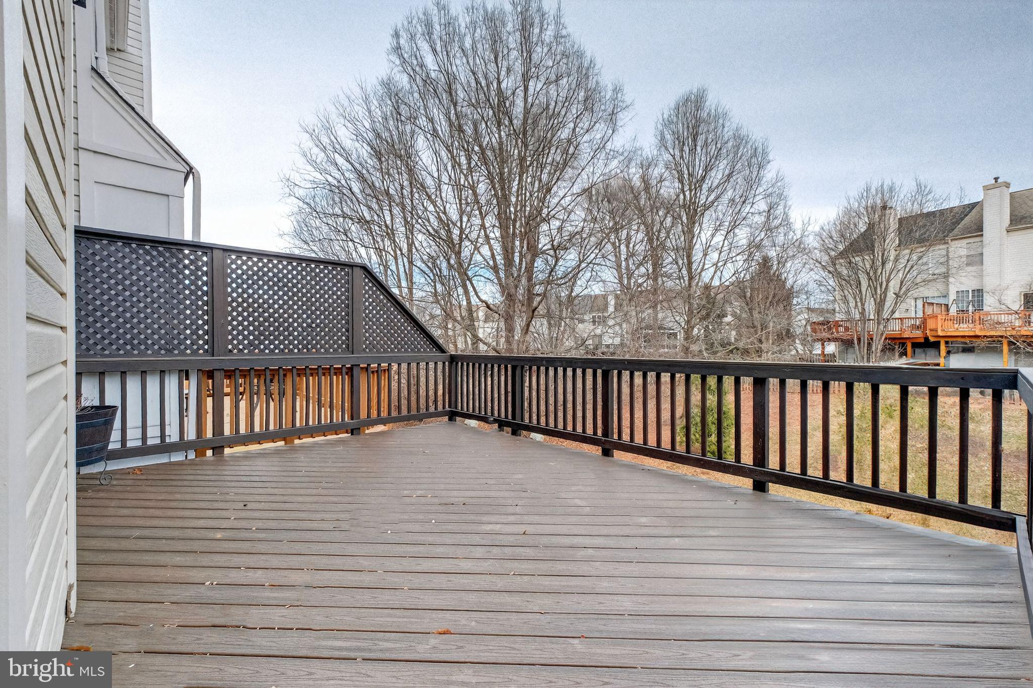 47610 Watkins Island Square Sterling, VA 20165 - Photo 17 of 48 a view of terrace with wooden floor and fence