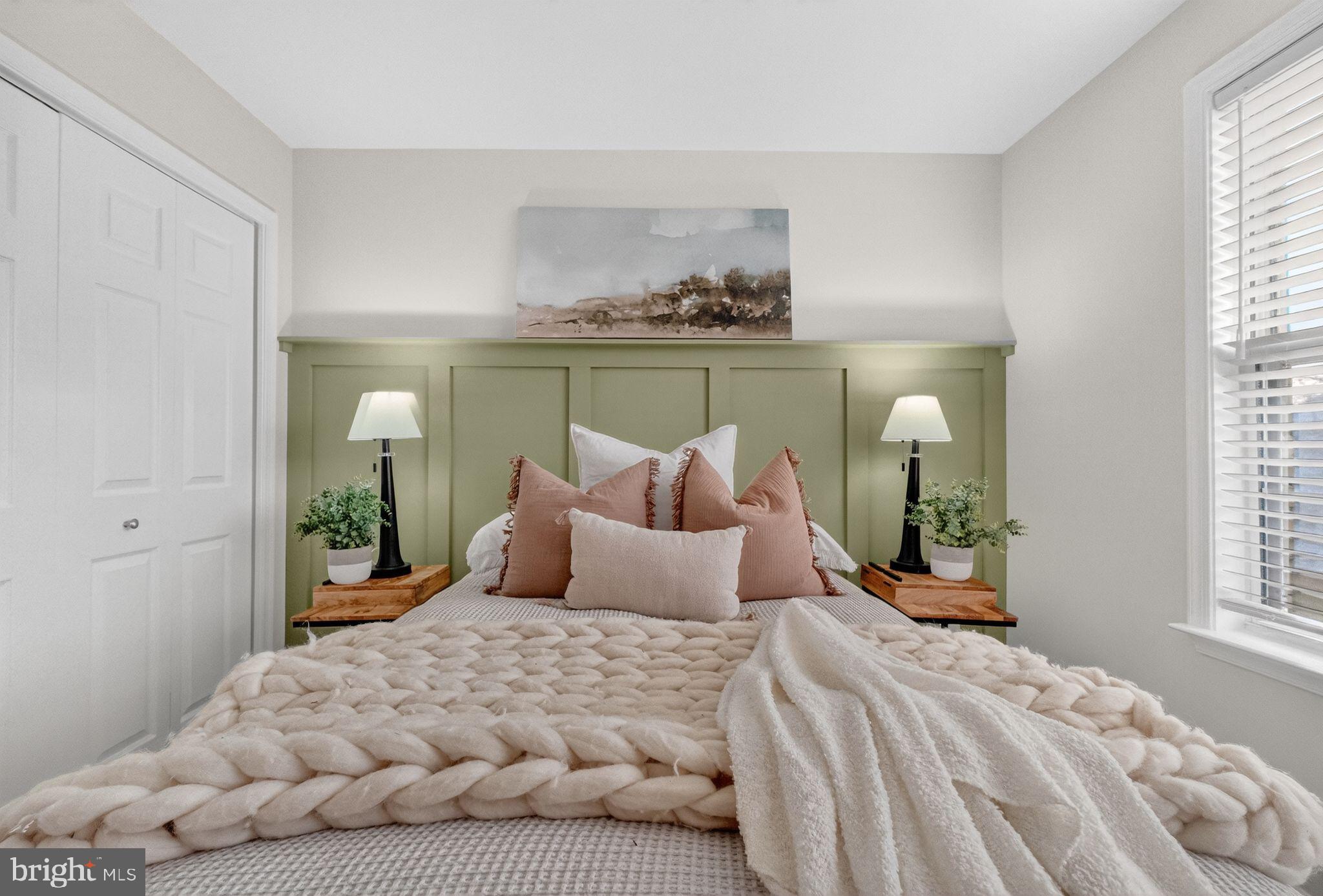 47610 Watkins Island Square Sterling, VA 20165 - Photo 28 of 48 a bedroom with a bed and window