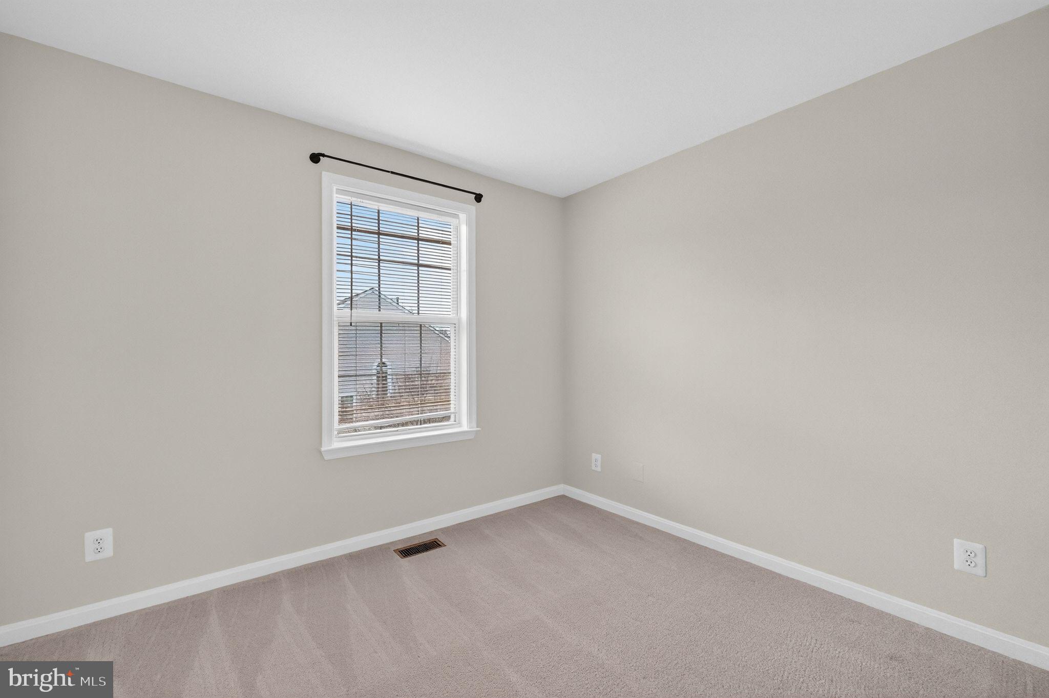 47610 Watkins Island Square Sterling, VA 20165 - Photo 30 of 48 an empty room with a window