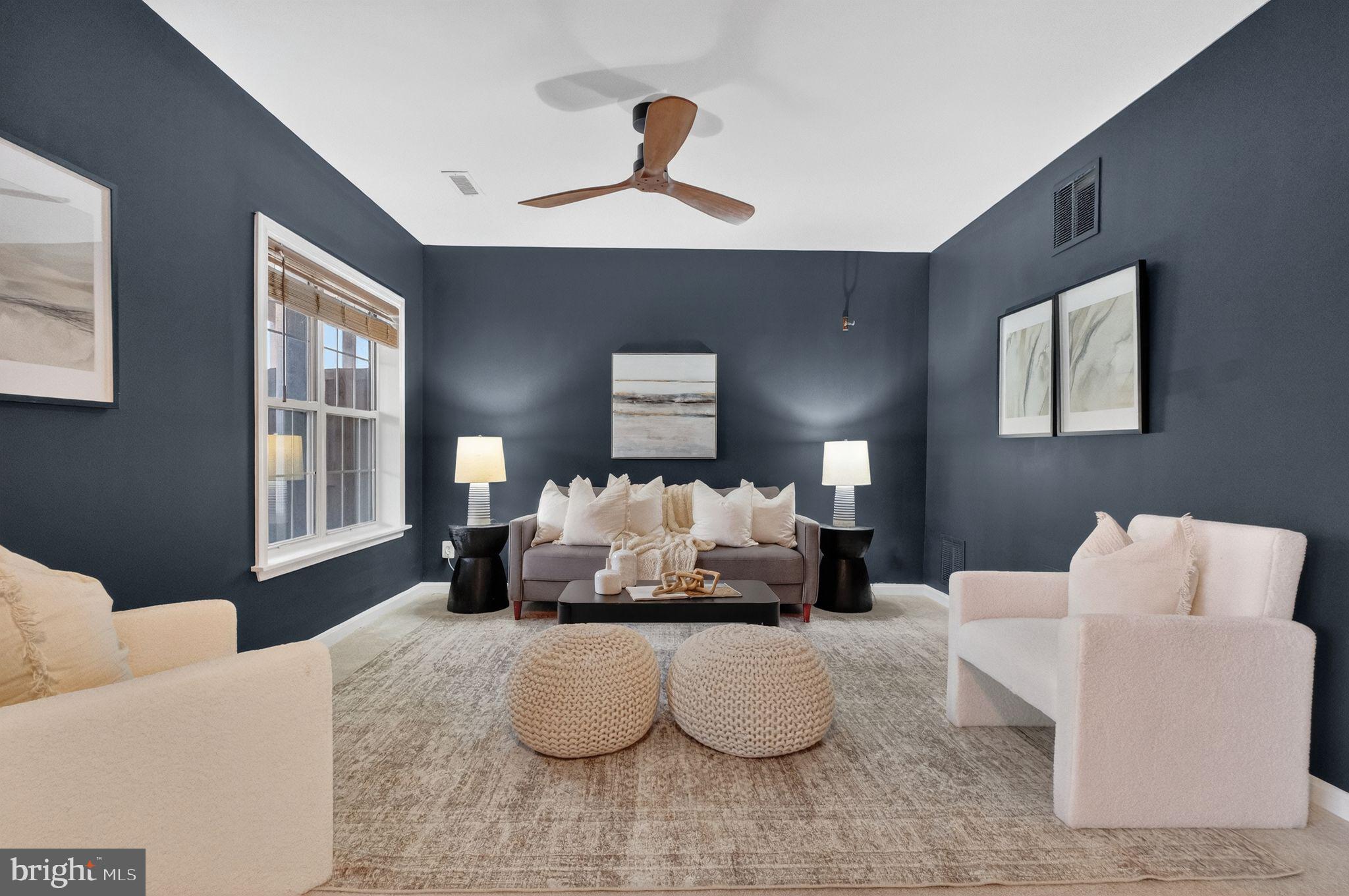 47610 Watkins Island Square Sterling, VA 20165 - Photo 33 of 48 a living room with furniture and a window