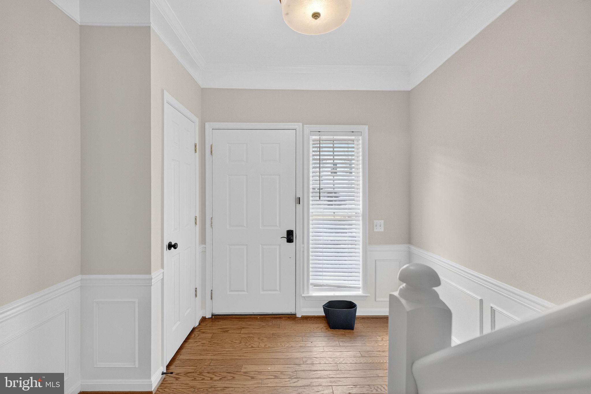 47610 Watkins Island Square Sterling, VA 20165 - Photo 40 of 48 a view of empty room with wooden floor and fan