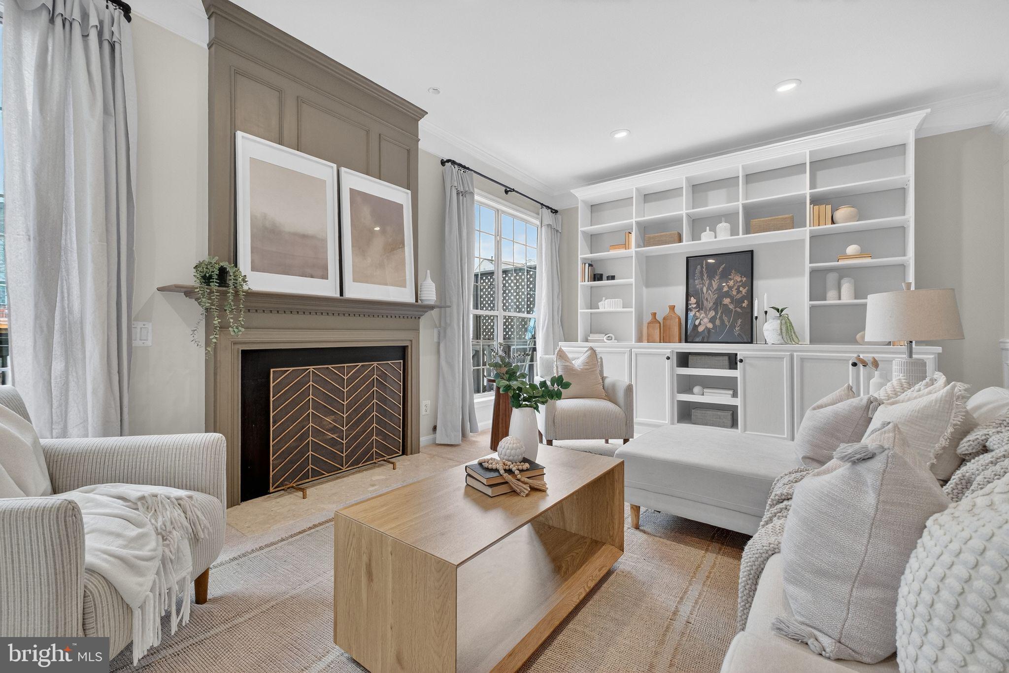 47610 Watkins Island Square Sterling, VA 20165 - Photo 4 of 48 a living room with furniture and a fireplace
