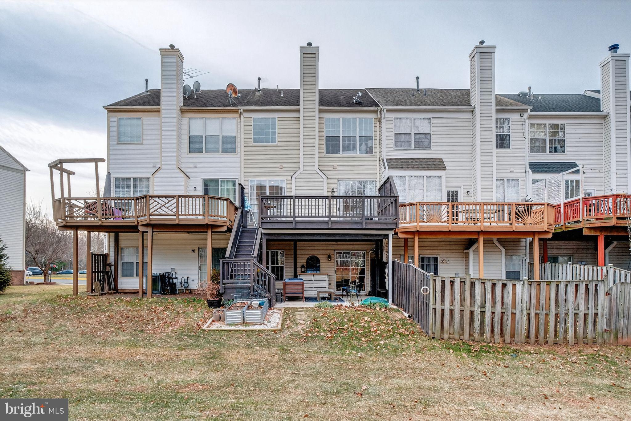 47610 Watkins Island Square Sterling, VA 20165 - Photo 41 of 48 a view of a building with a deck