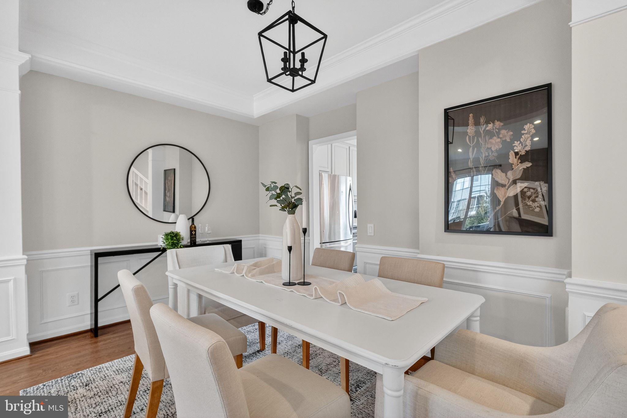 47610 Watkins Island Square Sterling, VA 20165 - Photo 8 of 48 a view of a dining room with furniture window and wooden floor
